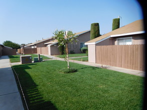 Desert Oasis Apartments in Adelanto, CA - Building Photo - Building Photo