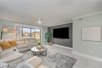 7101 Ridgewood Ave, Unit 102 in Cape Canaveral, FL - Building Photo - Building Photo