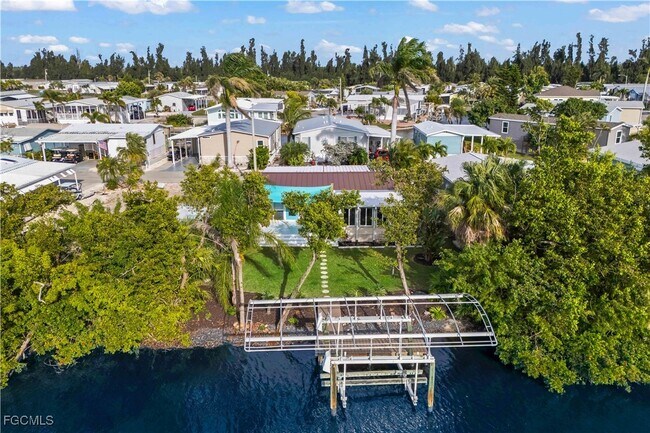 7150 Cobiac Dr in Saint James City, FL - Building Photo - Building Photo