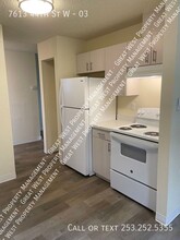 7613 44th St W-Unit -03 in University Place, WA - Foto de edificio - Building Photo