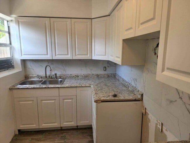 property at 117 SW 7th Ave