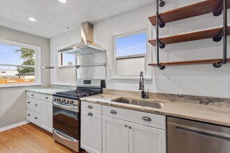 Brick bungalow-style Clayton home near Sch in Denver, CO - Building Photo - Building Photo