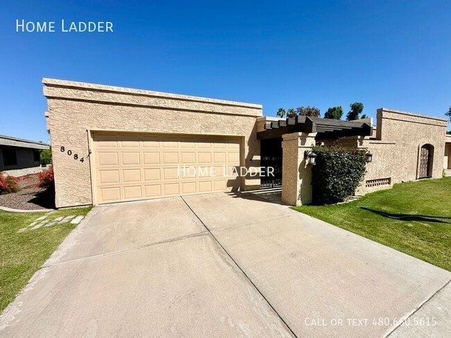 property at 8084 E Del Laton Dr