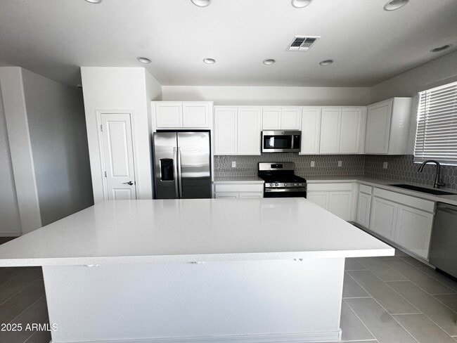 property at 9957 W Mitchell Ave