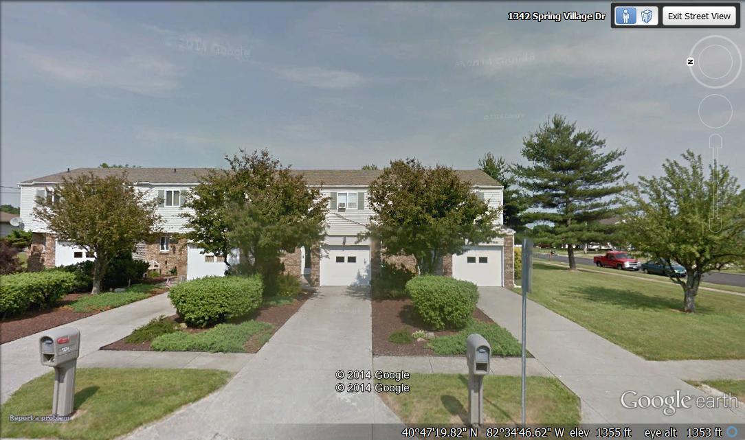 1334 Spring Village Dr in Ontario, OH - Foto de edificio
