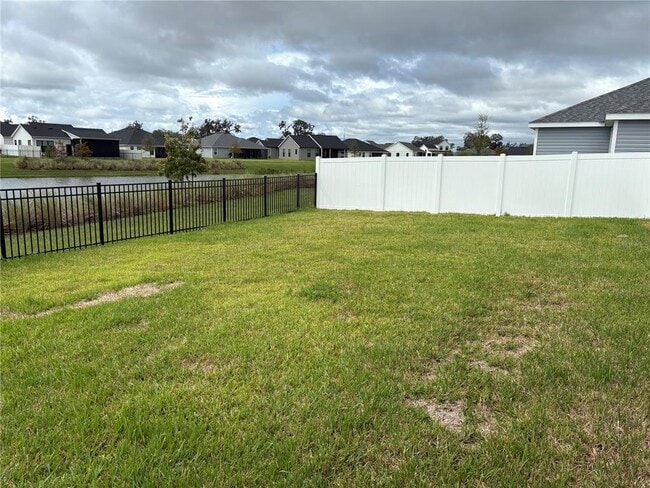 7882 Gershaneck Cir in Okahumpka, FL - Building Photo - Building Photo