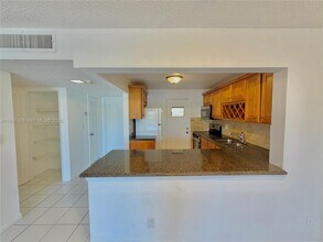 2320 S Cypress Bend Dr in Pompano Beach, FL - Building Photo - Building Photo