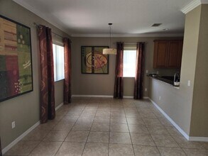 1250 Clove Dr in Poinciana, FL - Building Photo - Building Photo