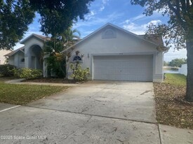 3166 Lago Vista Dr in Melbourne, FL - Building Photo