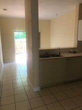 1677 SE 27th Ct, Unit 106 in Homestead, FL - Foto de edificio - Building Photo