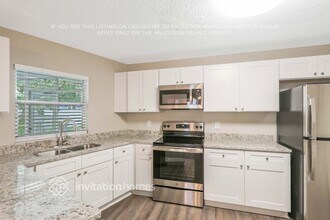 8814 Elm Leaf Ct in Port Richey, FL - Foto de edificio - Building Photo