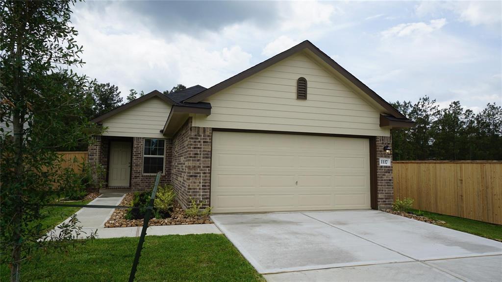 1117 Cedar Trace Pl in Pinehurst, TX - Building Photo