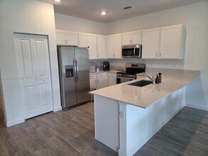 4343 Hammock Grove Dr in Greenacres, FL - Building Photo - Building Photo