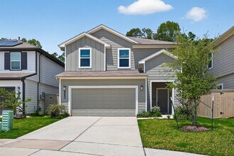 14128 Upper Gardenia Ln in Splendora, TX - Foto de edificio - Building Photo