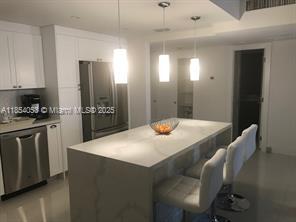 property at 19390 Collins Ave