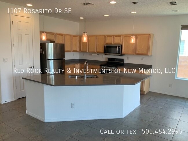 1107 Rosarito Dr SE in Rio Rancho, NM - Building Photo - Building Photo
