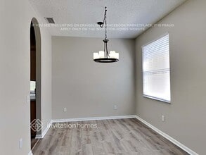 4417 Tarkington Dr in Land O Lakes, FL - Foto de edificio - Building Photo