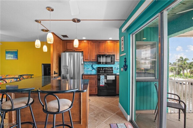 property at 3903 Del Prado Blvd S