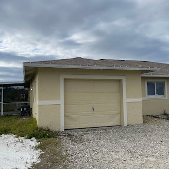 1130 Homer Ave S in Lehigh Acres, FL - Building Photo - Building Photo