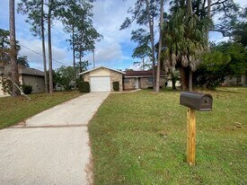 19 Woodston Ln in Palm Coast, FL - Building Photo