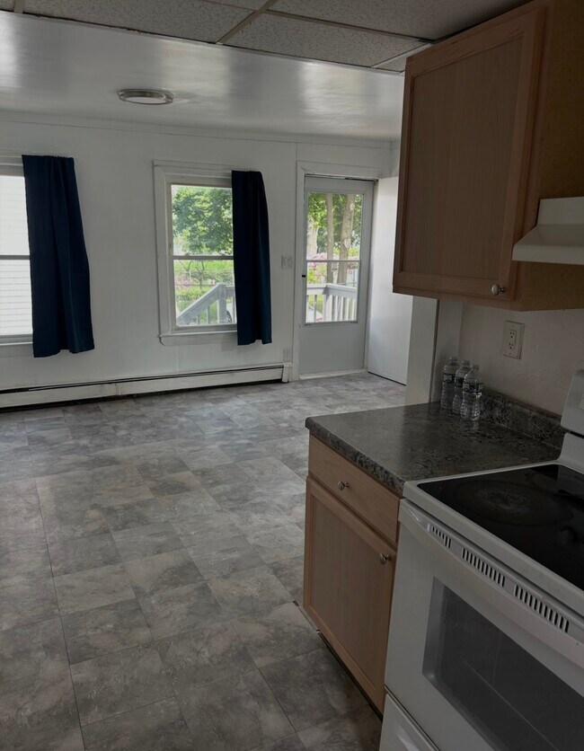 4 Quigley Ct, Unit 4 in Winchester, MA - Foto de edificio - Building Photo