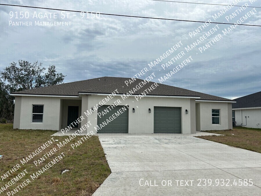 9150 Agate St in Port Charlotte, FL - Building Photo