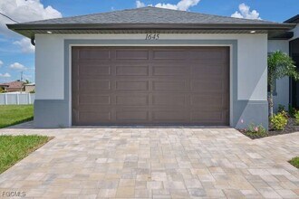 1645 NW 38th Pl in Cape Coral, FL - Building Photo - Building Photo