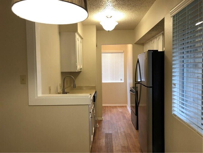 property at 6907 Woodhue Dr