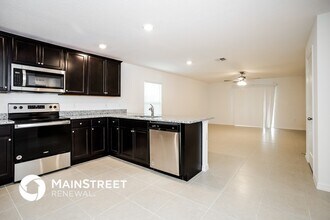 1685 Hideaway Flat St in Mascotte, FL - Building Photo - Building Photo