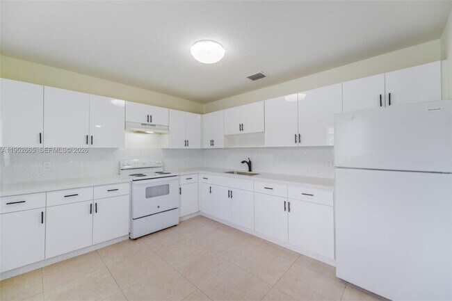 property at 6320 NW 1st Pl