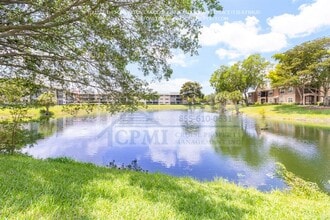 The Palms At Forest Hills - 2930 Forest Hills Blvd. in Coral Springs, FL - Building Photo - Building Photo