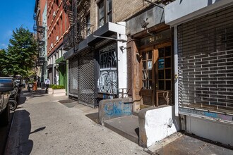 98-100 Thompson St in New York, NY - Building Photo - Building Photo