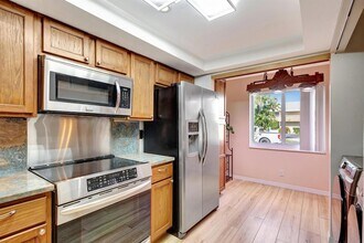 3110 Surf Way, Unit 4 in Riviera Beach, FL - Building Photo - Building Photo