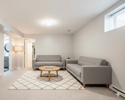 18418 65 Av in Surrey, BC - Building Photo