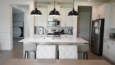 1365 Harvest Vw Xing in Loxahatchee, FL - Building Photo - Building Photo