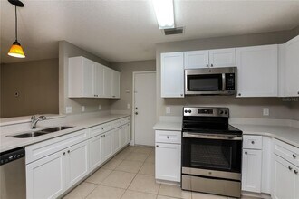 10729 Satinwood Cir in Orlando, FL - Foto de edificio - Building Photo