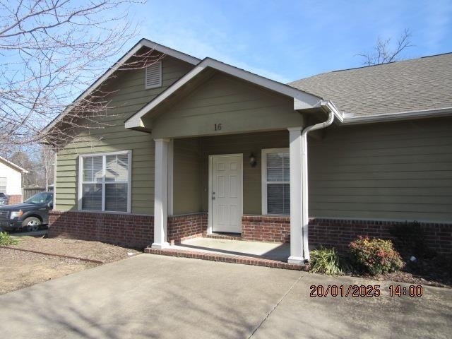 1410 Robins St in Conway, AR - Building Photo