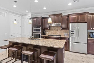 16133 Camden Lakes Cir in Naples, FL - Building Photo - Building Photo