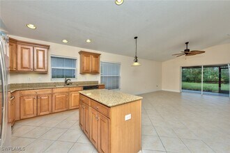 13584 Troia Dr in Estero, FL - Building Photo - Building Photo