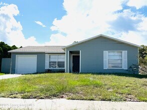 1542 W Powder Horn Rd in Titusville, FL - Building Photo - Building Photo