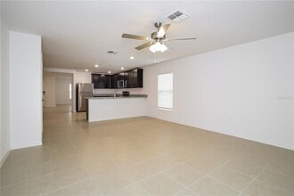 1682 Hideaway Flat St in Mascotte, FL - Building Photo - Building Photo