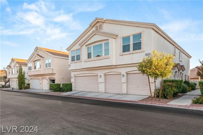 8695 Tomnitz Ave in Las Vegas, NV - Building Photo - Building Photo