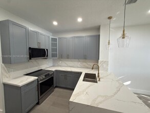 12618 NW 56th Dr in Coral Springs, FL - Building Photo - Building Photo