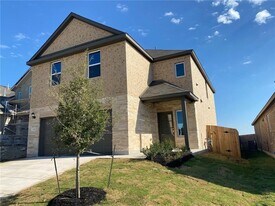 670 Pepperbark Loop in Mustang Ridge, TX - Building Photo
