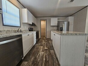 6571 Hidden Oaks Dr in North Fort Myers, FL - Building Photo - Building Photo