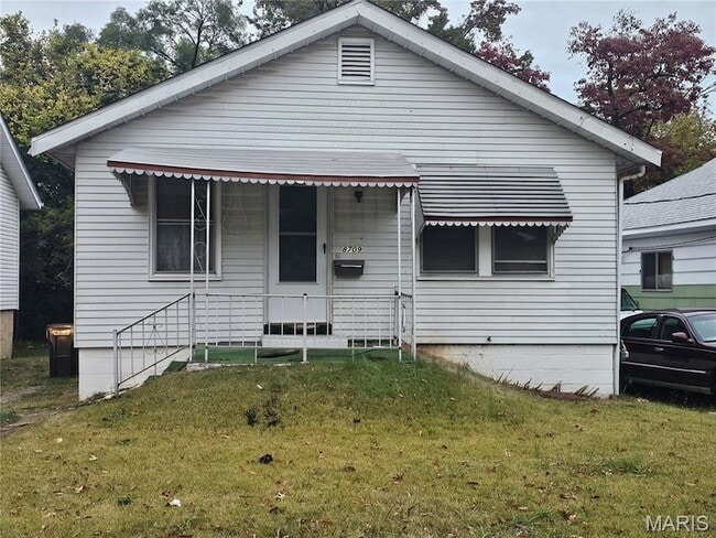 property at 8709 Alva Ave