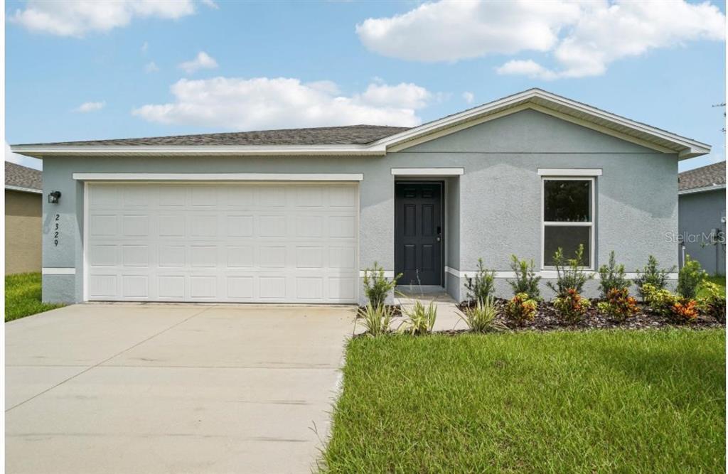 2329 Oklahoma Dr in Sumterville, FL - Building Photo