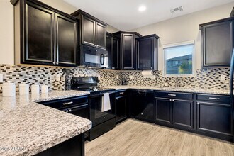 18069 W Tasha Dr in Surprise, AZ - Building Photo - Building Photo