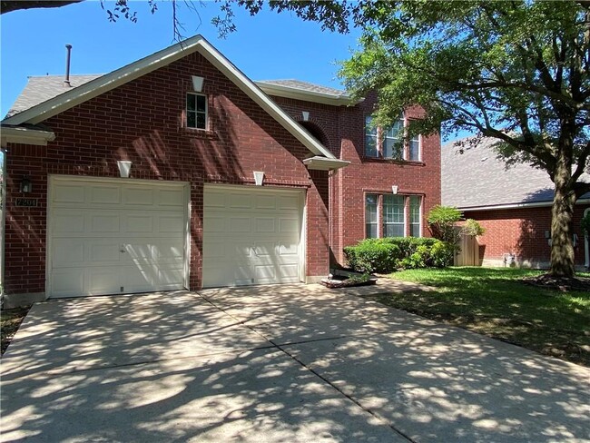 7204 W Magic Mountain Ln in Round Rock, TX - Foto de edificio - Building Photo