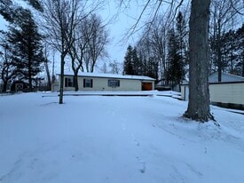 12599 S White Potato Lake Rd in Pound, WI - Building Photo